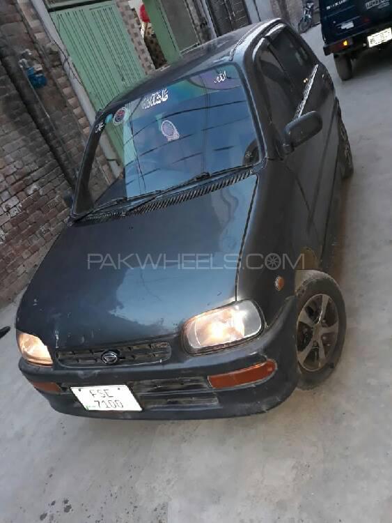 ڈائیہاتسو کیور - 2004 coure ڈائیہاتسو کیور - 2004 coure Image-5