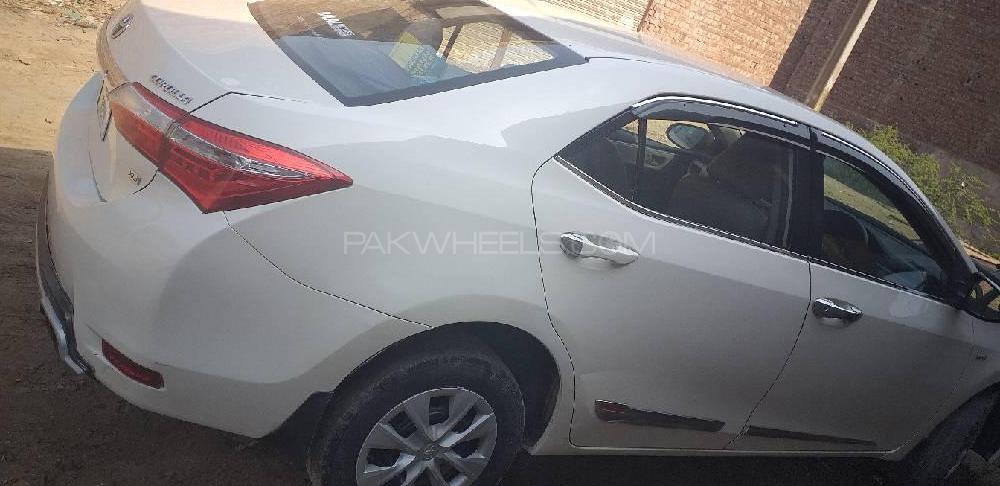 Toyota Corolla 2014 for Sale in Faisalabad Toyota Corolla 2014 for Sale in Faisalabad Image-4