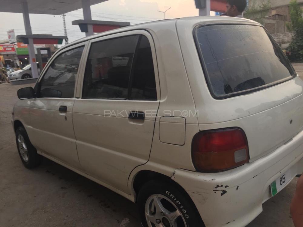 Daihatsu Cuore 2004 for Sale in Peshawar Daihatsu Cuore 2004 for Sale in Peshawar Image-2