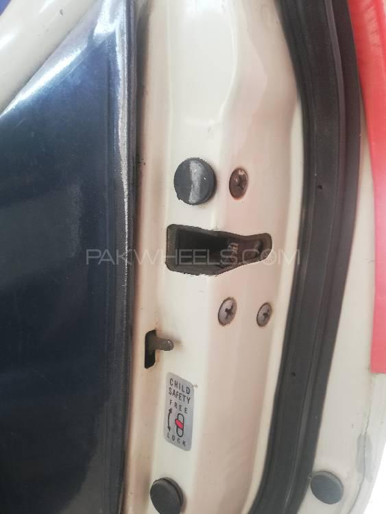 Daihatsu Cuore 2006 for Sale in Nowshera Daihatsu Cuore 2006 for Sale in Nowshera Image-10