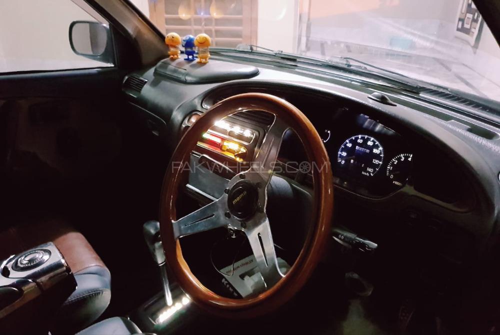 Daihatsu Cuore - 2007  Daihatsu Cuore - 2007  Image-3