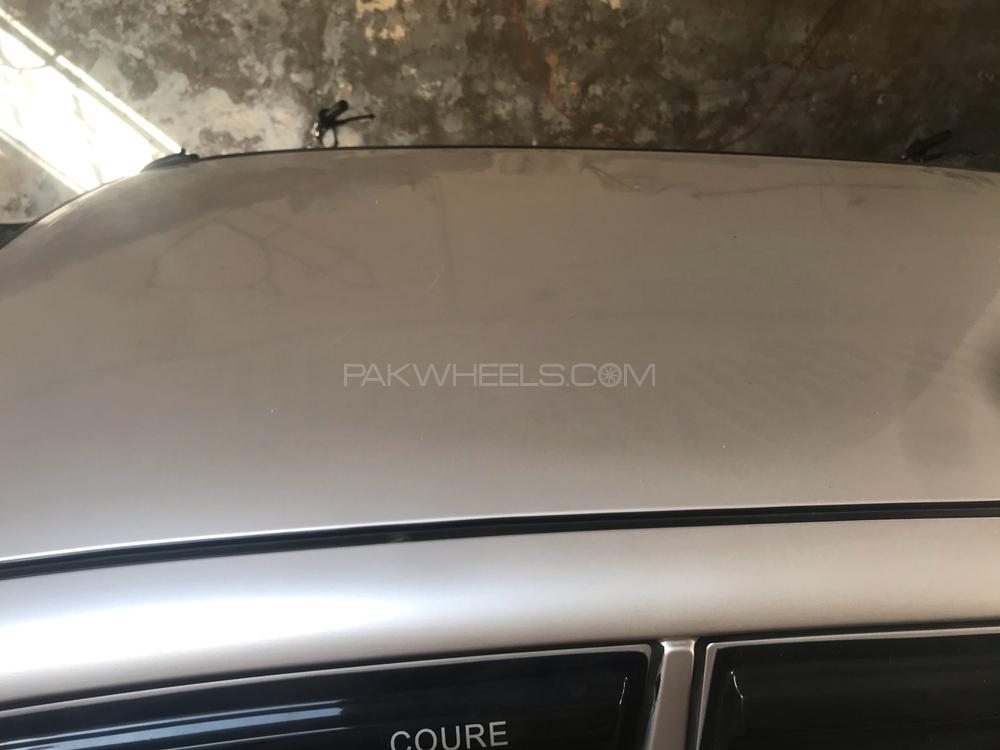 Daihatsu Cuore 2005 for Sale in Faisalabad Image-1