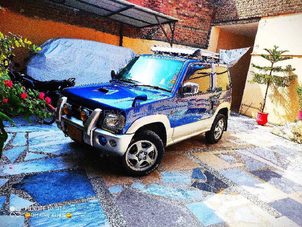 مٹسوبیشی پجیرو منی 2002 for Sale in ایبٹ آباد مٹسوبیشی پجیرو منی 2002 for Sale in ایبٹ آباد Image-10