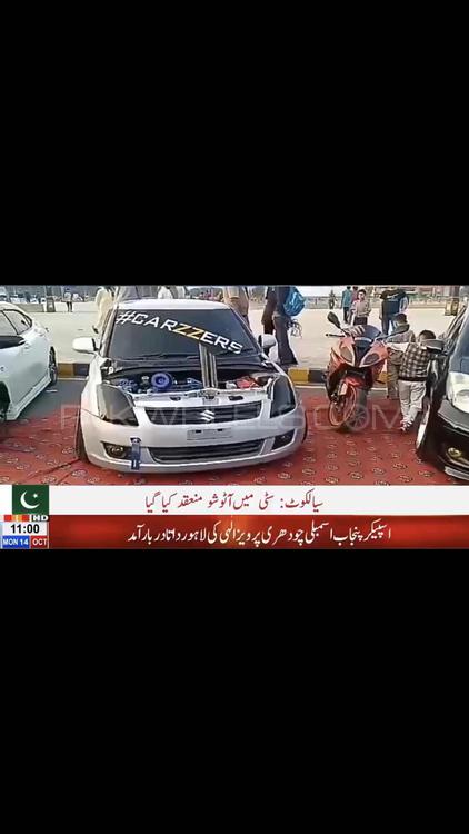 Suzuki Swift - 2013 Carzzers Suzuki Swift - 2013 Carzzers Image-2