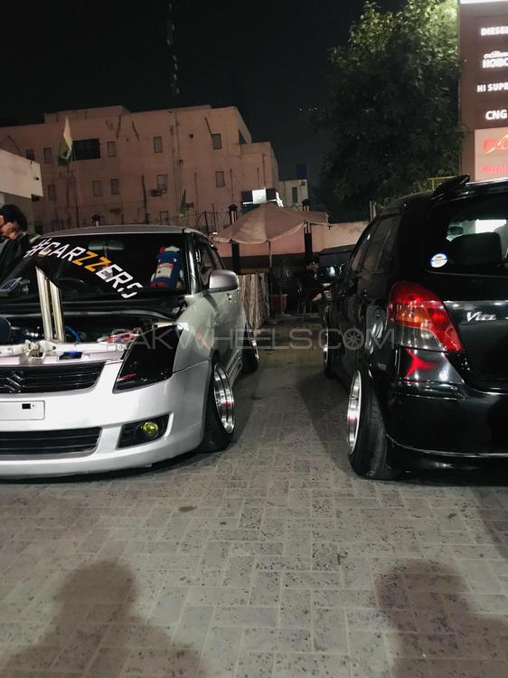 Suzuki Swift - 2013 Carzzers Suzuki Swift - 2013 Carzzers Image-9