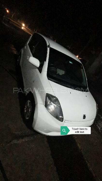 Toyota Passo - 2004 Smoothie Toyota Passo - 2004 Smoothie Image-2