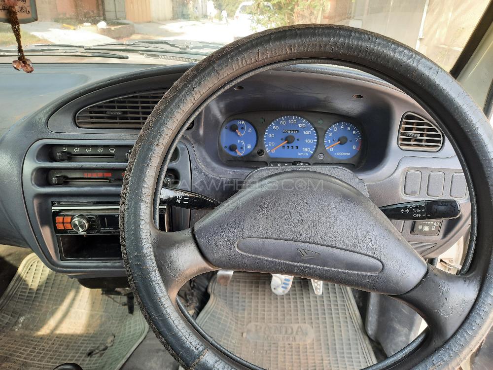 Daihatsu Cuore 2004 for Sale in Peshawar Daihatsu Cuore 2004 for Sale in Peshawar Image-6