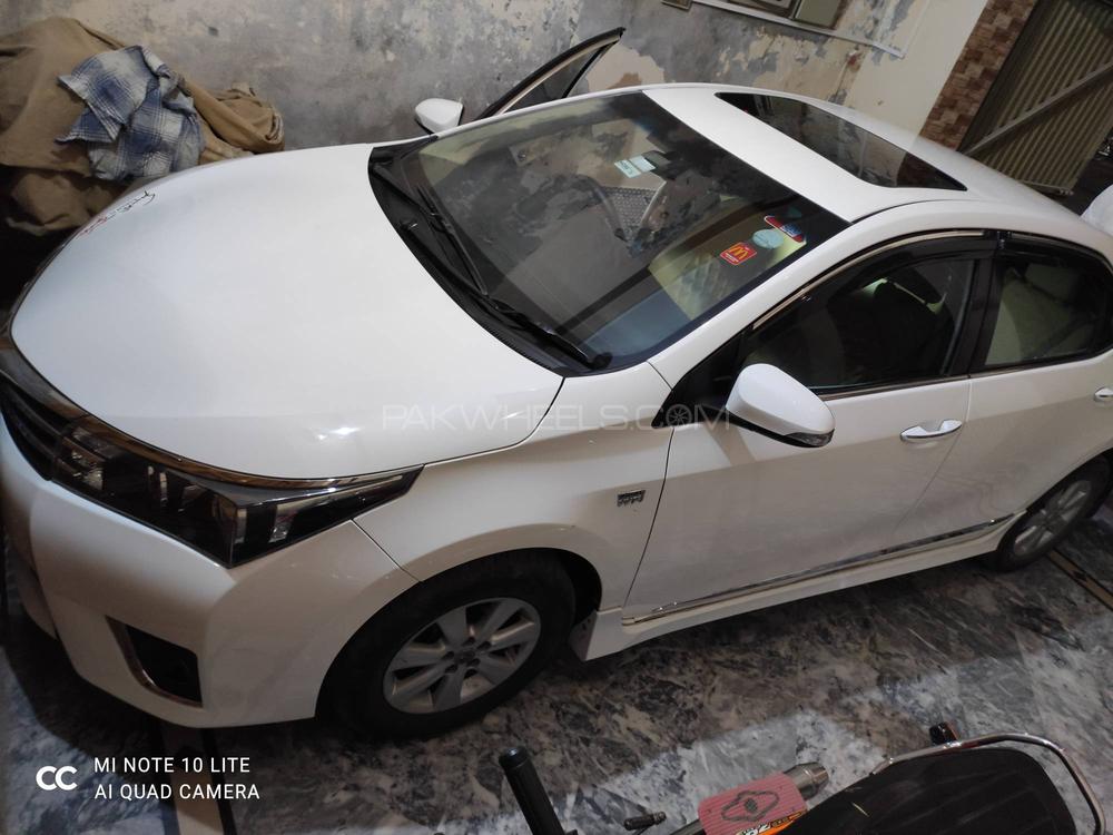 Toyota Corolla 2015 for Sale in Faisalabad Toyota Corolla 2015 for Sale in Faisalabad Image-6