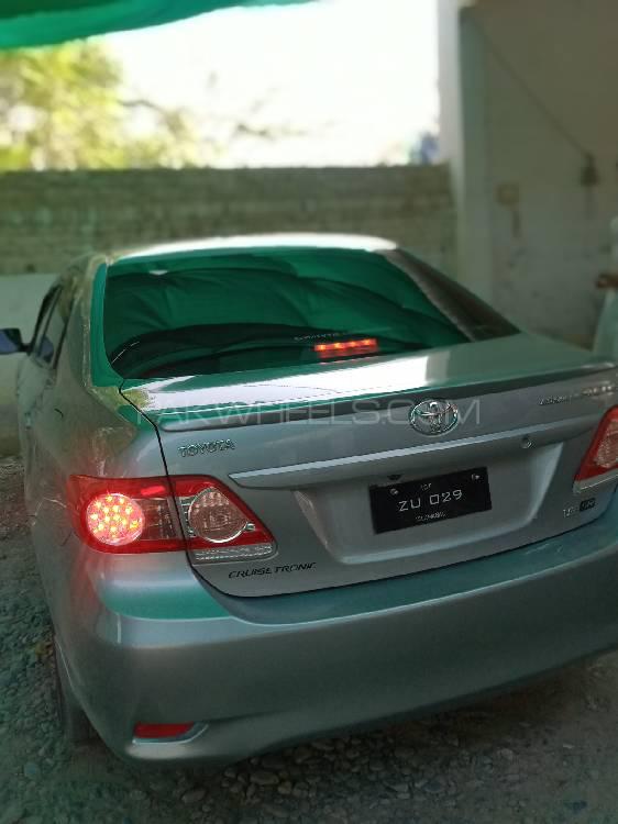 Toyota Corolla 2013 for Sale in Dera ismail khan Toyota Corolla 2013 for Sale in Dera ismail khan Image-9