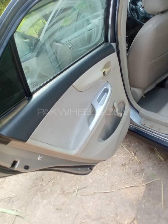 Toyota Corolla 2014 for Sale in Chak jhumra Toyota Corolla 2014 for Sale in Chak jhumra Image-6