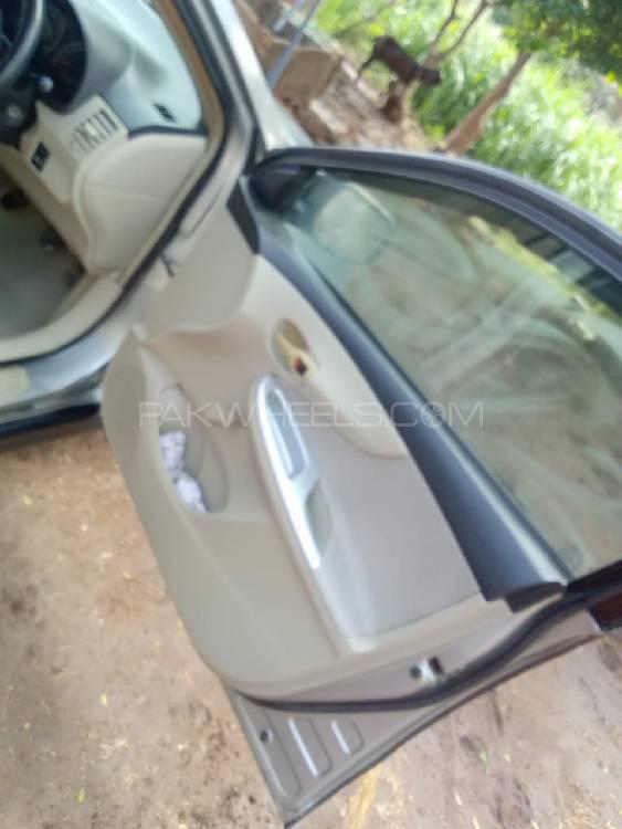 Toyota Corolla 2014 for Sale in Chak jhumra Toyota Corolla 2014 for Sale in Chak jhumra Image-8
