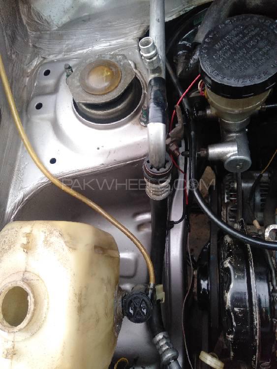 Daihatsu Cuore 2007 for Sale in Peshawar Daihatsu Cuore 2007 for Sale in Peshawar Image-9