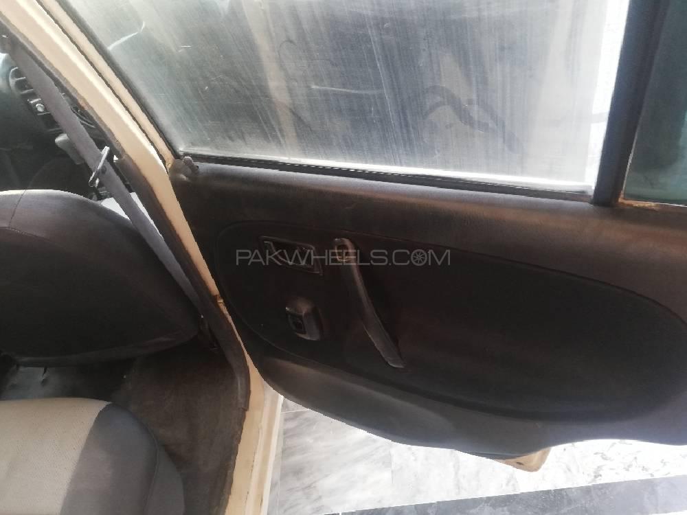 Daihatsu Cuore 2004 for Sale in Lahore Daihatsu Cuore 2004 for Sale in Lahore Image-6