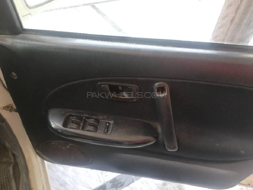Daihatsu Cuore 2004 for Sale in Lahore Daihatsu Cuore 2004 for Sale in Lahore Image-17