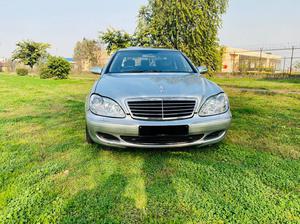 Mercedes-Benz S350  (business package )
2003/December 
import from Japan 2007 registered Islamabad 2010
top of the line specs.
excellent condition
Total original paint ( spotless )
full service history
Silver metallic with black nappa leather interior 
Glass electric Sunroof 
Front seats electric multi power & heating seats
Heated steering wheel 
Self levelling suspension 
8  zone climate control air conditioning 
Xinon headlights 
AMG alloy wheels 
Crome package 
Parktronic access 
Electric curtains 
Spear wheel unused 
Up to date all taxes 
First owner car
Further information please call & physically visit at Victory Cars jail road Lahore.