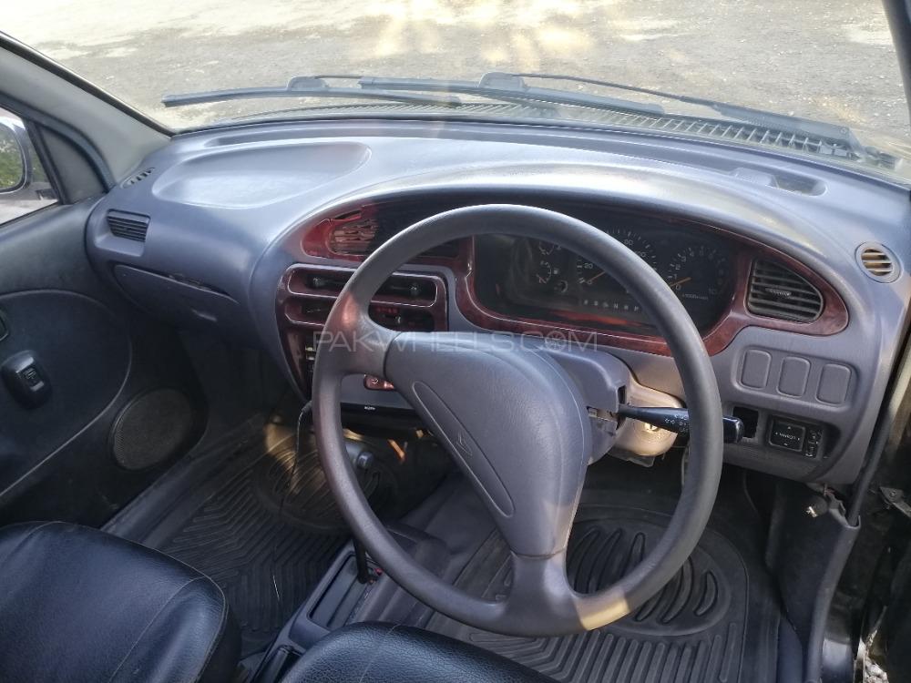 Daihatsu Cuore 2009 for Sale in Nowshera Daihatsu Cuore 2009 for Sale in Nowshera Image-4