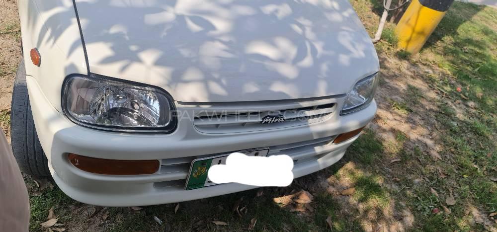 Daihatsu Cuore 2012 for Sale in Faisalabad Image-1