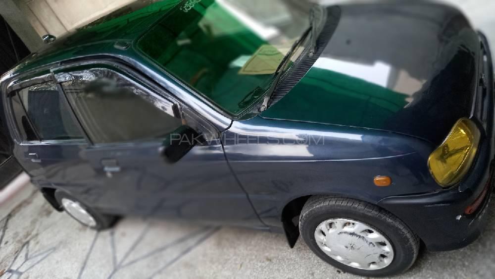 Daihatsu Cuore 2004 for Sale in Faisalabad Image-1