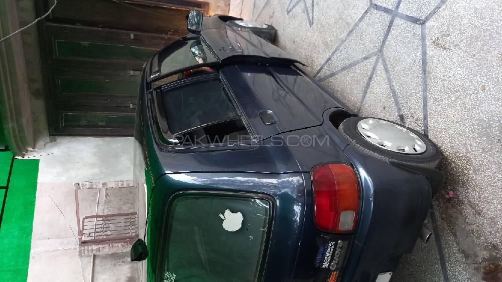 Daihatsu Cuore 2004 for Sale in Faisalabad Daihatsu Cuore 2004 for Sale in Faisalabad Image-2