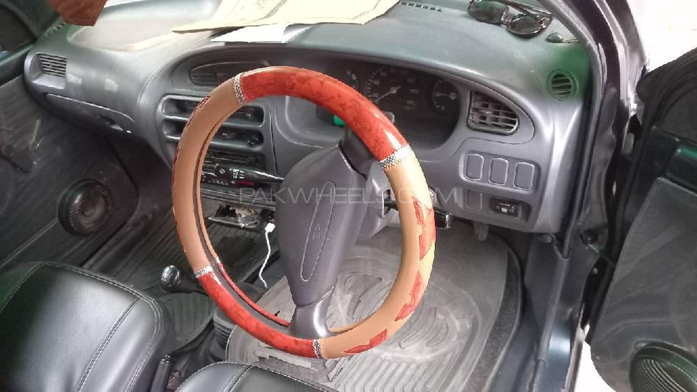 Daihatsu Cuore 2004 for Sale in Faisalabad Daihatsu Cuore 2004 for Sale in Faisalabad Image-11