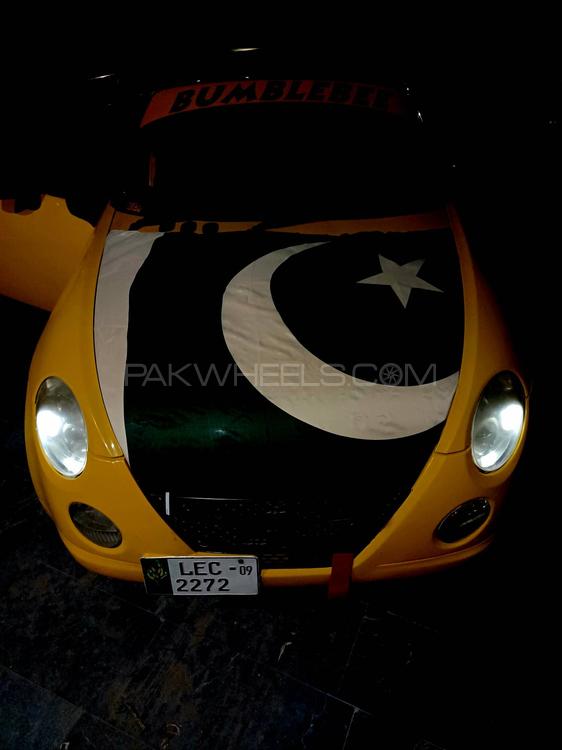 ڈائیہاتسو کوپن - 2009 Bumblebee Image-1