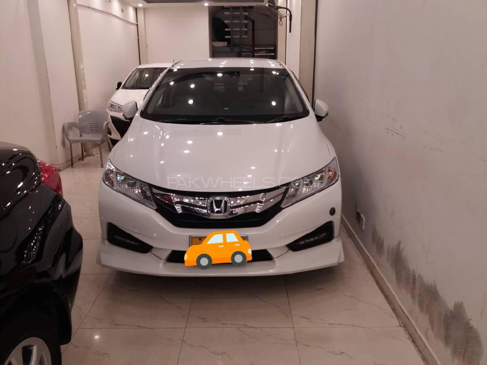 Honda Grace Hybrid 2014 for Sale in Karachi Image-1