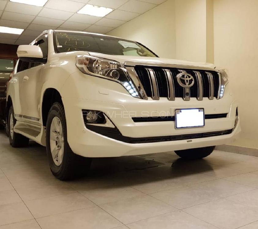 Toyota Prado TXL 2.7L
Model 2016
Un Registered
Clearence May 2021
Pearl White
Beige Room
Sunroof 
Leather Electric Seats
7 seater
Original TV
3 Cameras
Wooden/Multi Function Stearing
Cruise Control
Ambient Lighting
Body Kit
Roof Rails
LED Head Lights
Wooden Trims

Location: 

Prime Motors
Allama Iqbal Road, 
Block 2, P..E.C.H.S,
Karachi