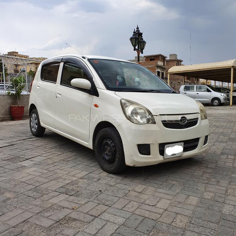 Daihatsu mira 2009 год