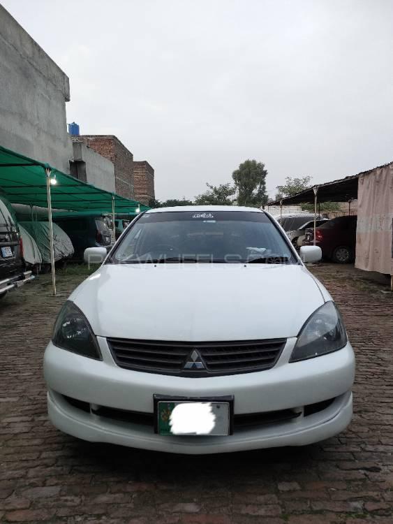 مٹسوبیشی لینسر - 2004  مٹسوبیشی لینسر - 2004  Image-4