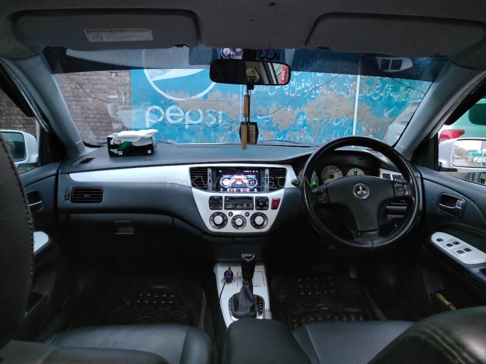 مٹسوبیشی لینسر - 2004  مٹسوبیشی لینسر - 2004  Image-9