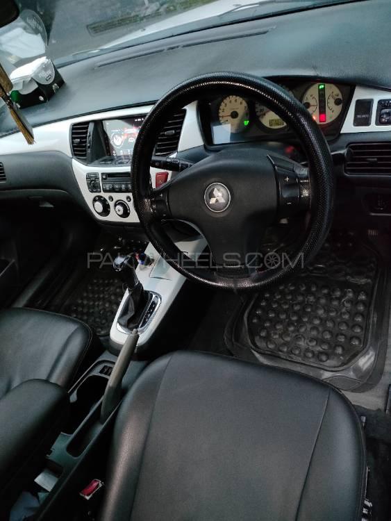 مٹسوبیشی لینسر - 2004  مٹسوبیشی لینسر - 2004  Image-10