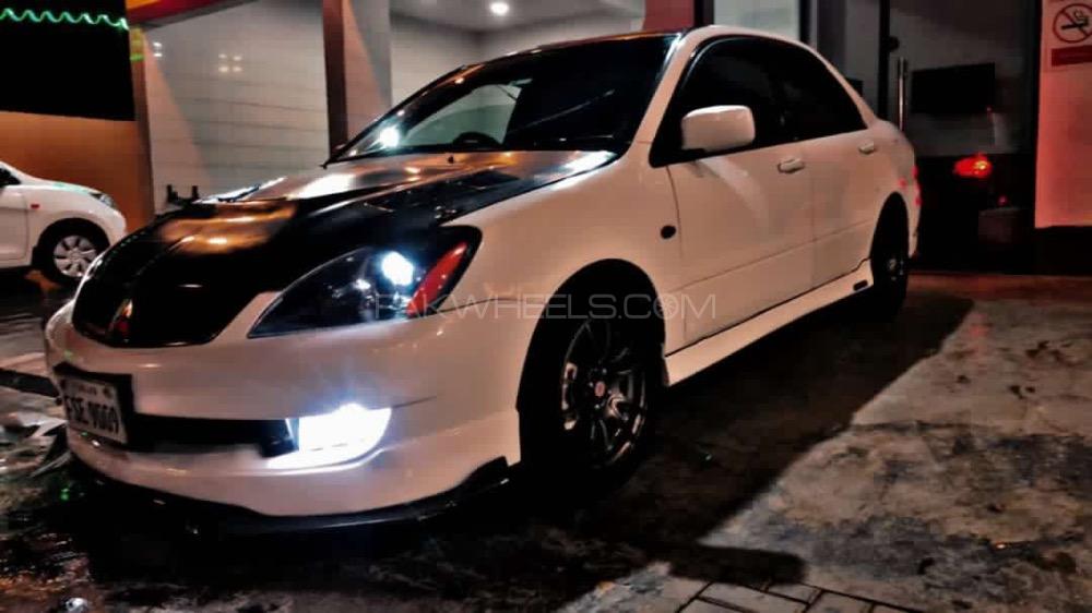 مٹسوبیشی لینسر - 2006  مٹسوبیشی لینسر - 2006  Image-8