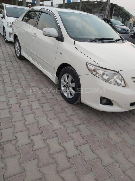 Toyota Corolla 2010 for Sale in Peshawar Toyota Corolla 2010 for Sale in Peshawar Image-4