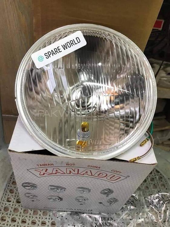 Xanadu headlight with Bulb H4 halogen tube. Image-1