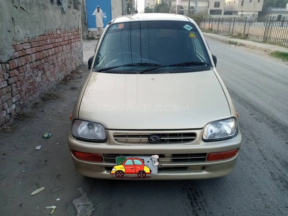 Daihatsu Cuore 2011 for Sale in Faisalabad Image-1