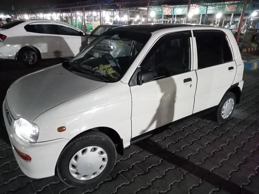 Daihatsu Cuore 2006 for Sale in Faisalabad Image-1