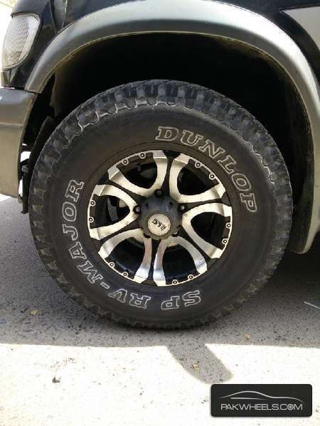 15'' jeep rims with tires going cheap For Sale Image-1
