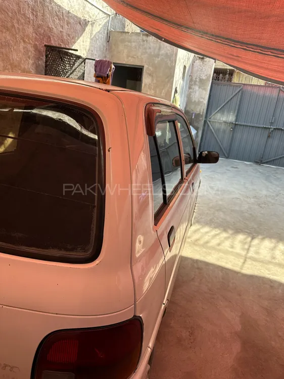 Daihatsu Cuore 2004 for Sale in Faisalabad Image-1