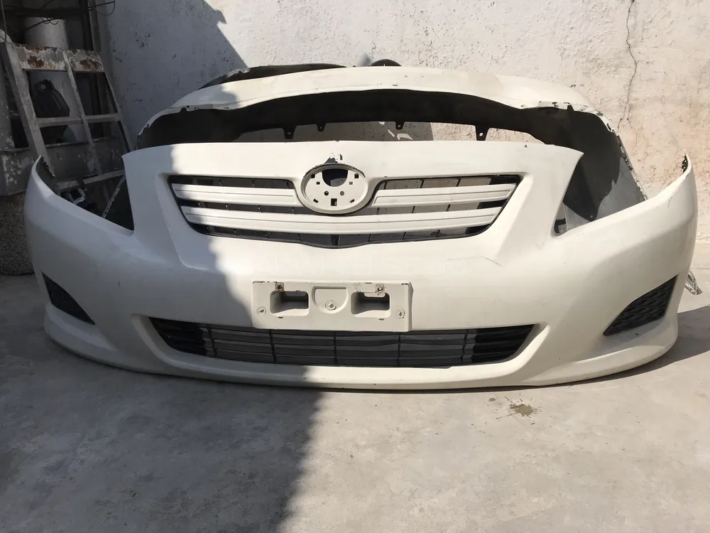 2010 model Corolla Front & back Genuine bumper . And head Light front/ Back . Brand new Image-1