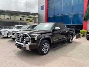 Make:Toyota Tundra
1794 Edition CrewMax 5.5' Bed
2nd in Pakistan 
Model: 2022
Mileage: Only 5000 miles  
Engine:3.5L V-6 Gas Turbocharged 4WD
Exterior Color: Smoked Mesquite

 POPULAR FEATURES:
*Premium Wheels
*Moonroof
*Premium Audio
*Navigation
*Premium Seat Material
*Front Heated Seats
*Front Cooled Seats
*Remote Engine Start
*Multi-Zone Climate Control
*Adaptive Cruise Control
*Blind Spot System
*Lane Keep Assist
*Backup Camera
*Parking Sensors
*12 Speakers
*Tow Hitch
*Memory Seats

Calling and Visiting Hours 

Monday to Friday

11:00 am to 7:00 pm