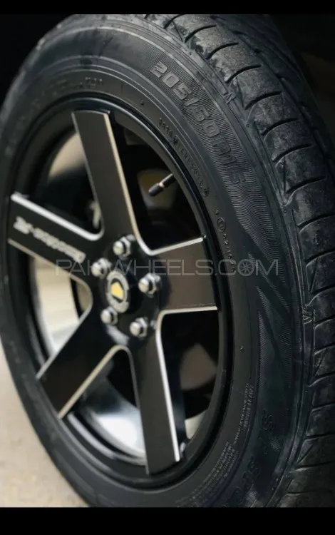 16 inches Emotions Alloy Rims with Tires. Enhance your vehicle appearance with Emotions and care Image-1