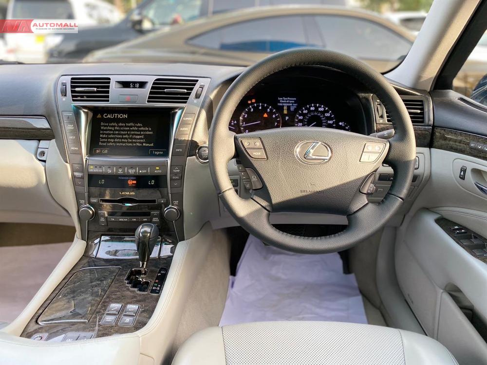 Make: Lexus LS 460
Model: 2009
Mileage: 41,400 miles 
Reg year: 2011

*4.6L V8 engine 
*Air suspension
*Long wheel base
*8 speed auto-transmission
*Rear wheel drive 
*Reclining ventilated bucket seats
*Heating/cooling seats
*Rear heated seats 
*Memory seats 
*Soft closing doors 
*Lexus premium sound system

Calling and Visiting Hours 

Monday to Saturday 

11:00 AM to 7:00 PM